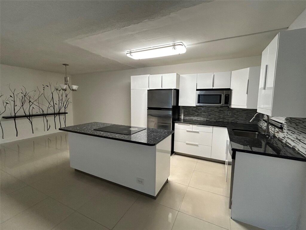 Property Photo:  1301 NW 12th Avenue 316 A  FL 33486 