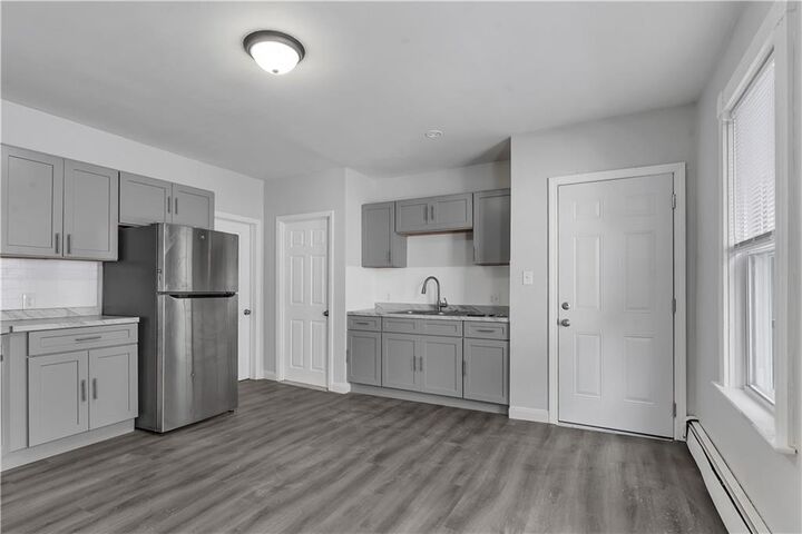 Property Photo:  52 Bellevue Avenue 1  RI 02895 