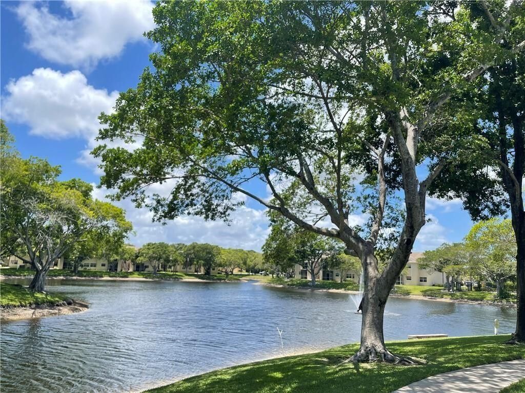 Property Photo:  640 Cypress Club Way J  FL 33064 