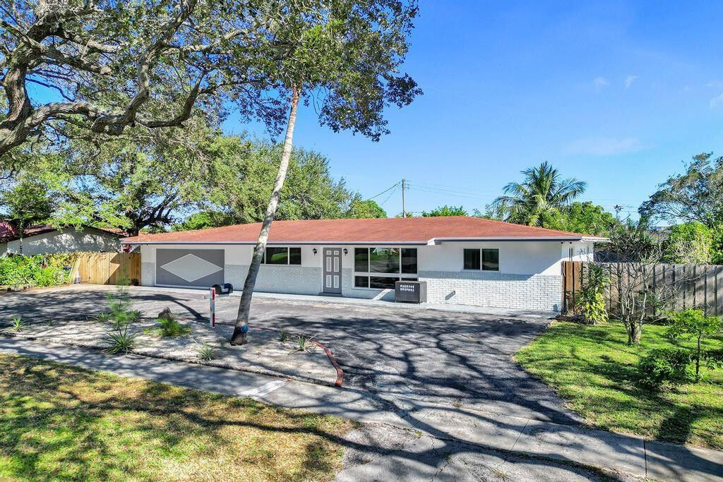 Property Photo:  616 NW 46th Avenue  FL 33317 