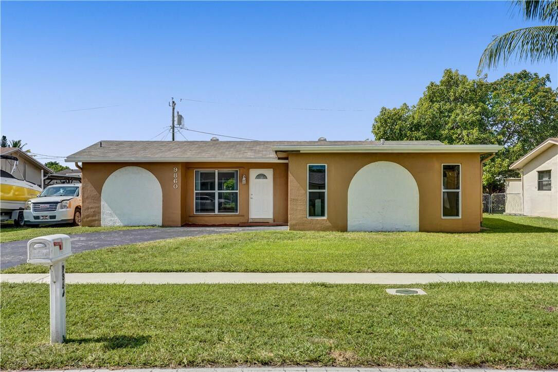Property Photo:  9860 NW 25th Court  FL 33322 