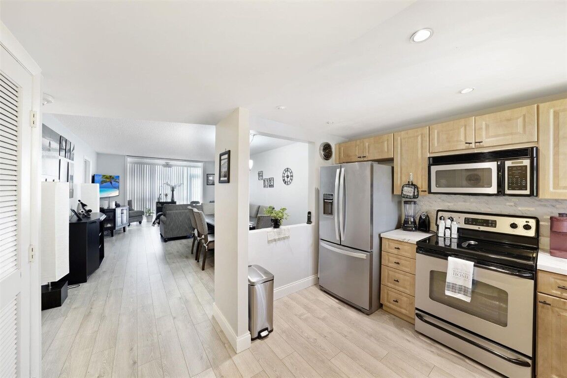 Property Photo:  8880 Sunrise Lakes Boulevard 103  FL 33322 