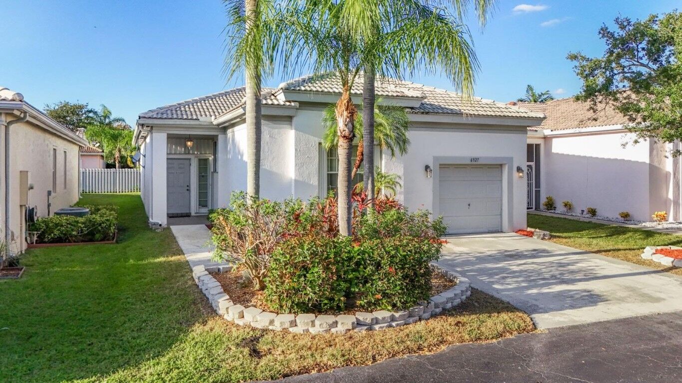 Property Photo:  6927 NW 32nd Street  FL 33063 