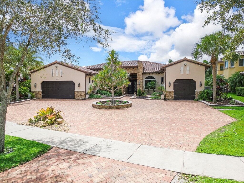 Property Photo: 12288 NW 69th Court FL 33076