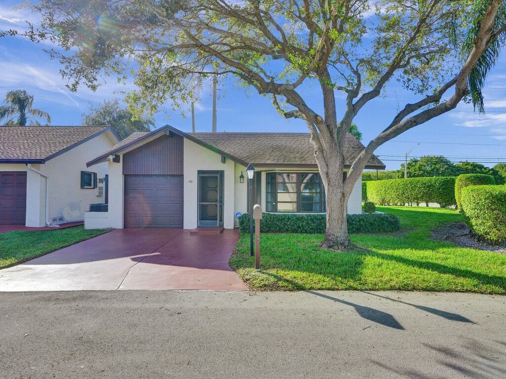 Property Photo:  1701 SW 23rd Way  FL 33442 