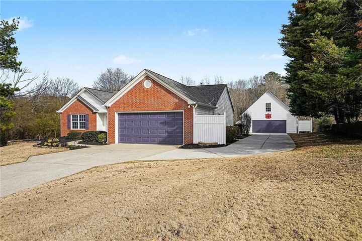 Property Photo:  8195 River Hill Commons Drive  GA 30107 