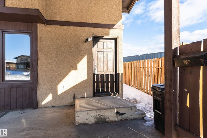 Property Photo:  8660 27 Avenue NW  AB T6K 2X4 