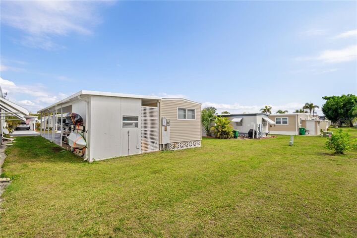 Property Photo:  24437 Harborview Road 55  FL 33980 