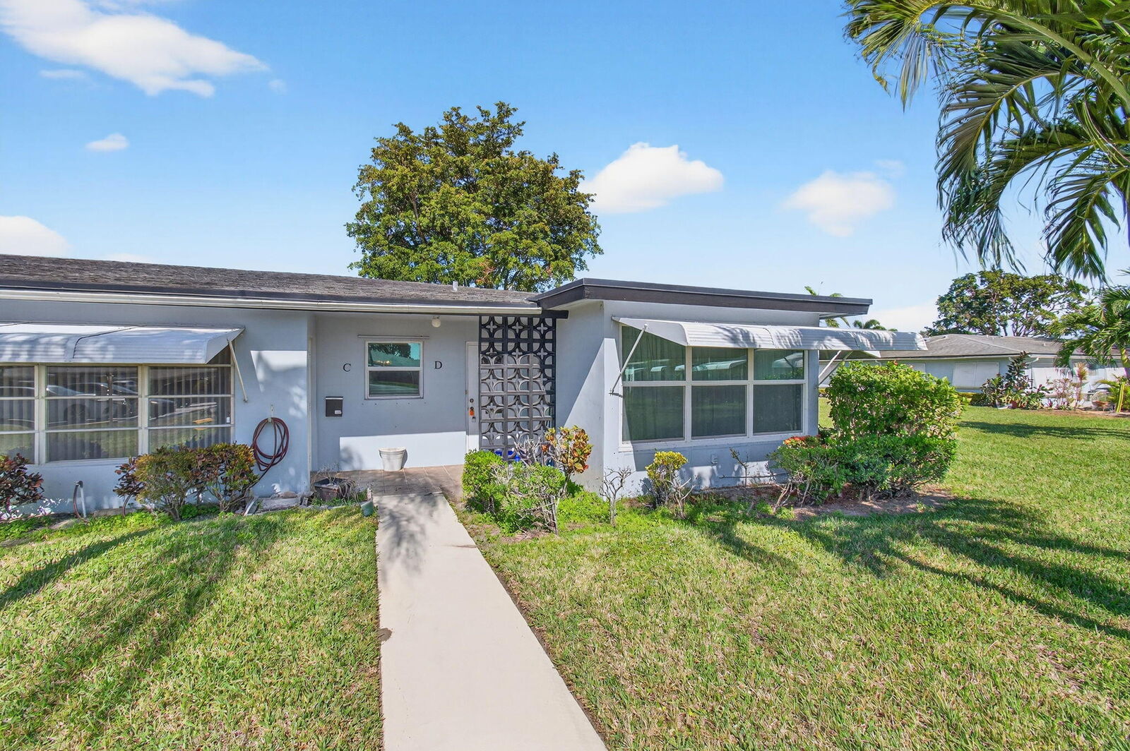 Property Photo:  417 High Point Boulevard  FL 33445 