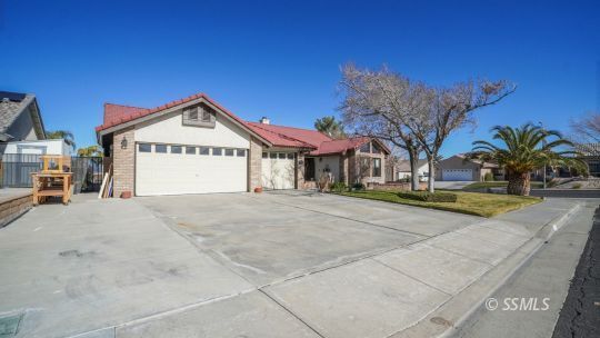 Property Photo:  108 W Smoke Tree Ave  CA 93555 