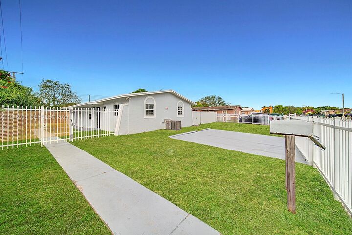 Property Photo:  19110 NW 36th Ave 19110  FL 33056 