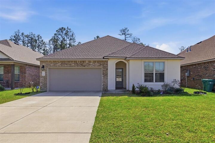 Property Photo:  1716 Sawgrass Drive  LA 70669 