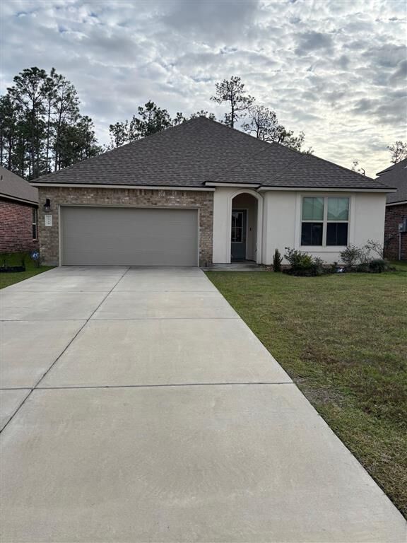 Property Photo:  1716 Sawgrass Drive  LA 70669 