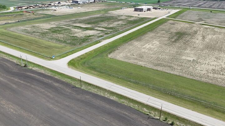 Property Photo: 4 431029 Range Road 261 AB T4J 1R4