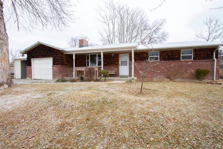 Property Photo:  6562 Everett Street  CO 80004 