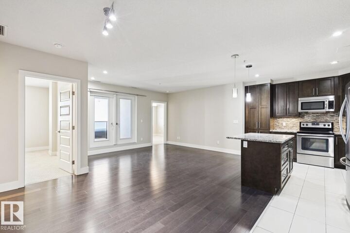 Property Photo: 1350 Windermere Way SW 208 AB T6W 2J3