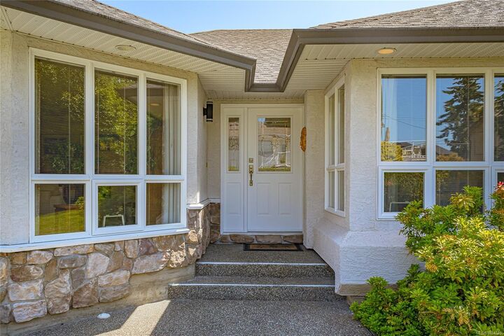 Property Photo:  6377 Rodolph Rd  BC V8Z 5W2 