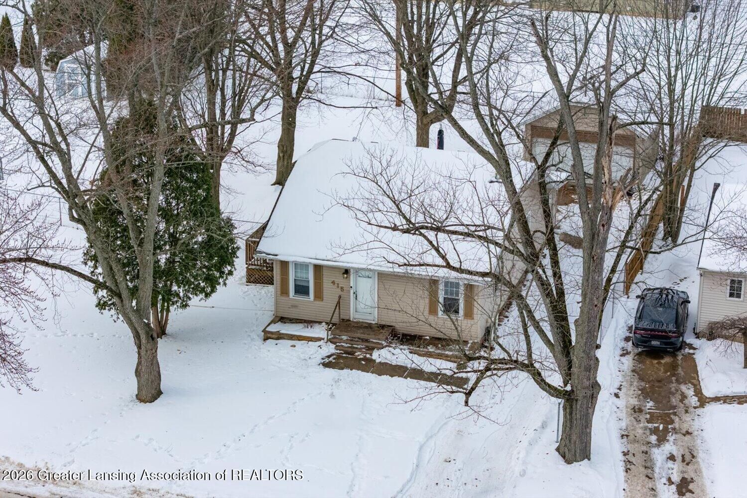 Property Photo:  415 Winifred Avenue  MI 48917 