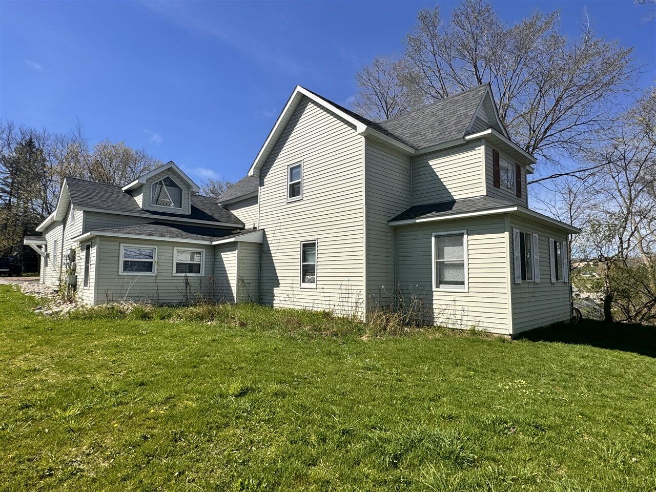 Property Photo:  138 E Sheridan Street  MI 49770-2962 