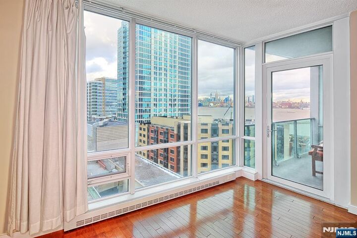 Property Photo: 20 Newport Parkway 1209 NJ 07310