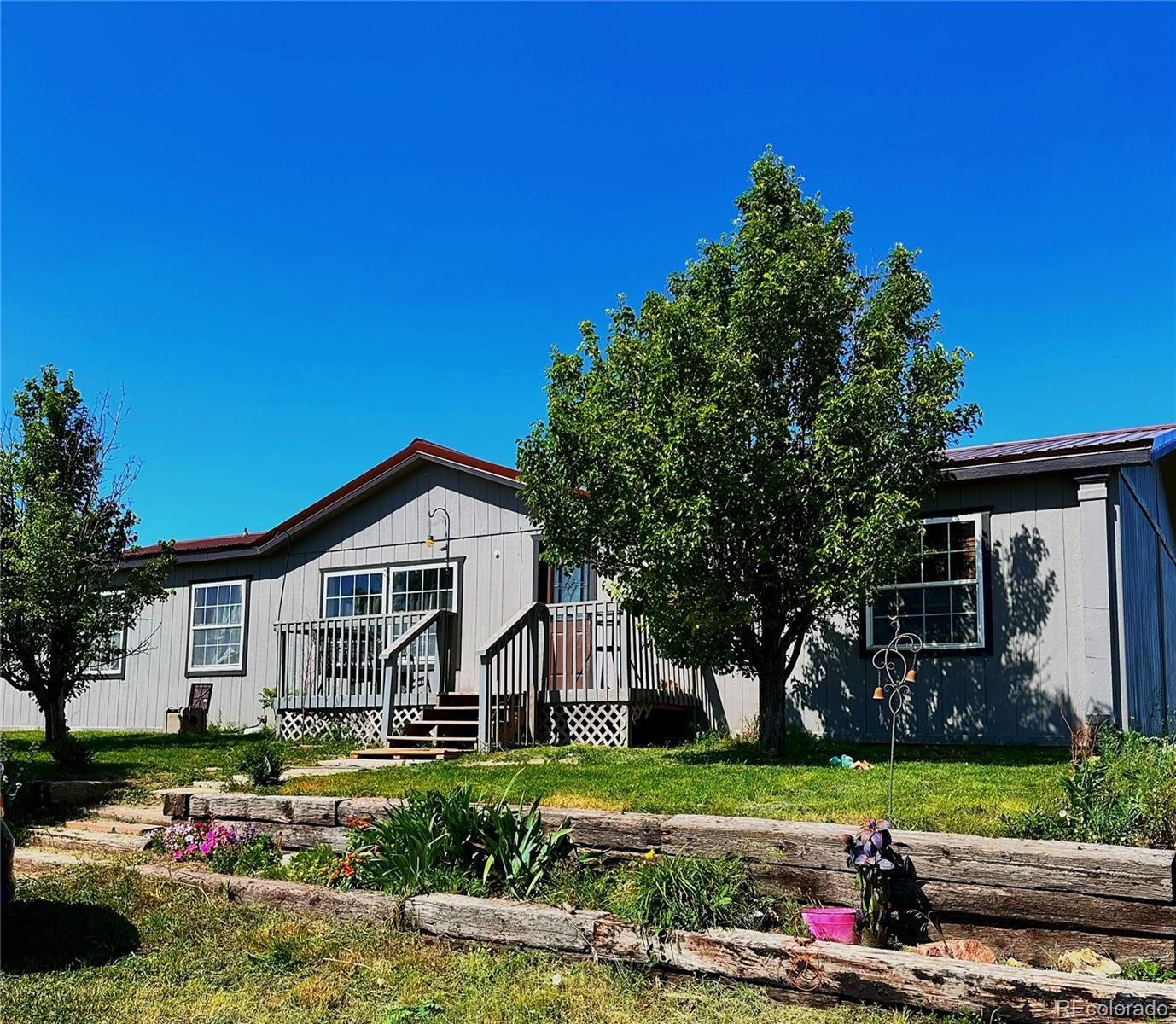 Property Photo:  47904 Dartmouth Avenue  CO 80102 