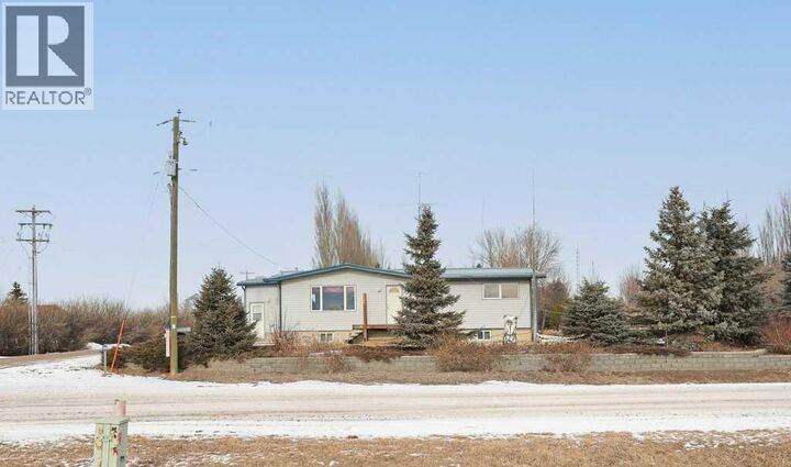 Property Photo: 145006 Cassils Road AB T1R 1B4