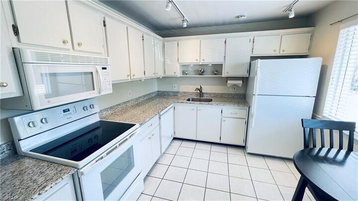 Property Photo:  801 Teryl Rd 4  FL 34112 
