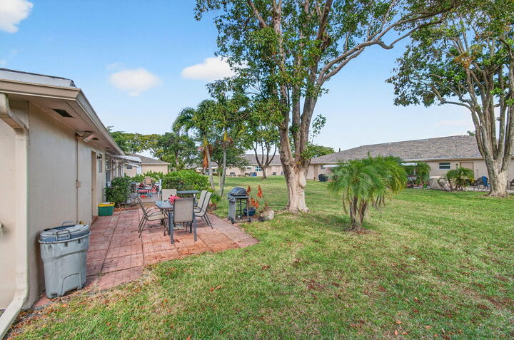 Property Photo:  1327 High Point Way SE D  FL 33445 