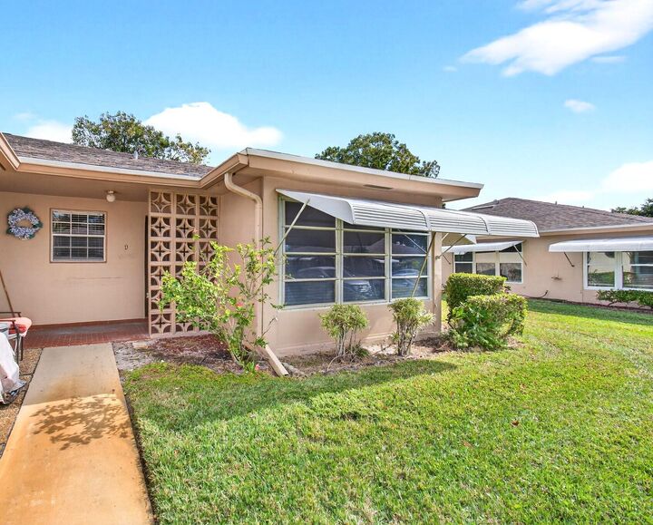 Property Photo:  1327 High Point Way SE D  FL 33445 