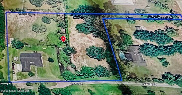 Property Photo:  4950 Country Place  FL 32949 