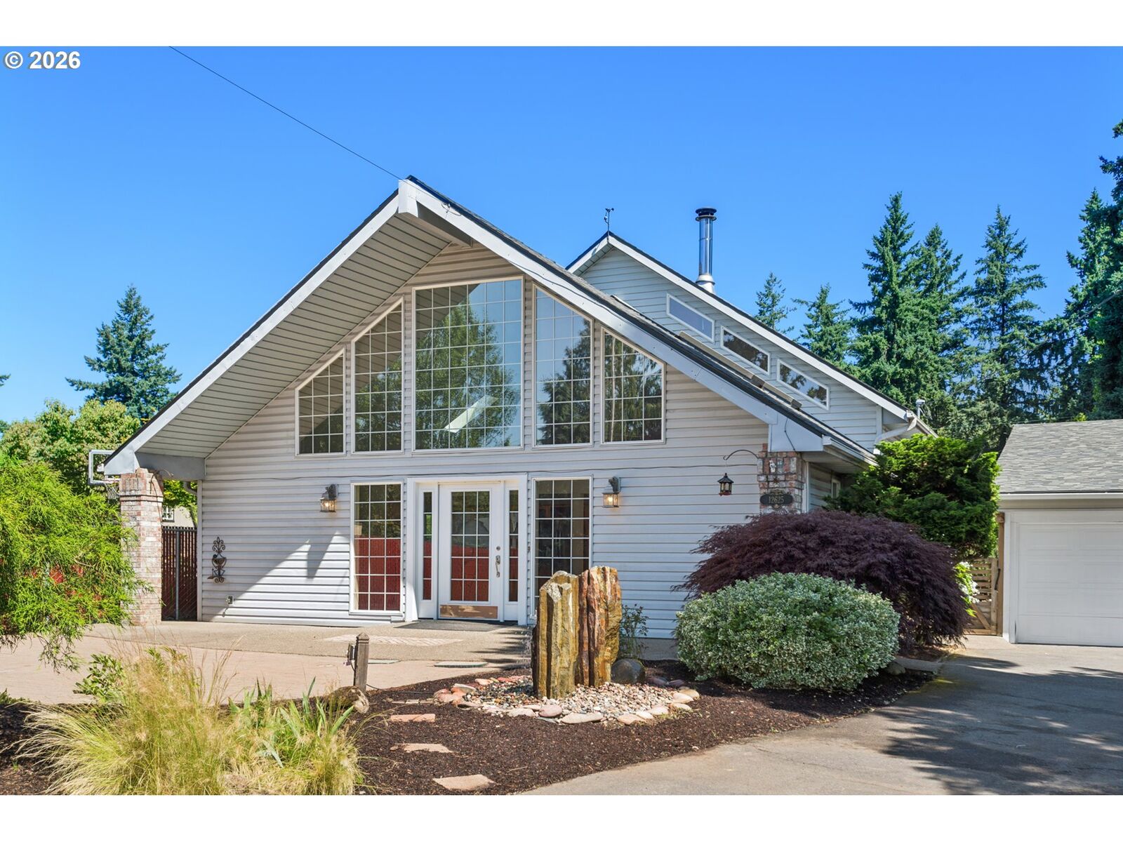 Property Photo:  12625 SE Sherman St  OR 97233 