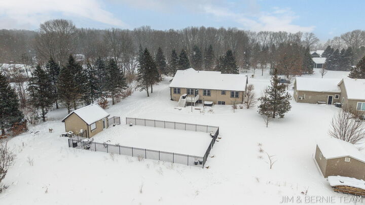 Property Photo:  6005 River Ridge Drive  MI 49419 