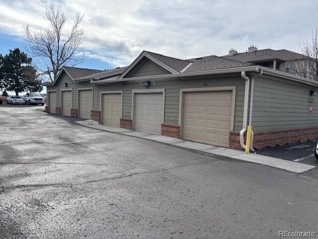 Property Photo:  12935 Ironstone Way 302  CO 80134 