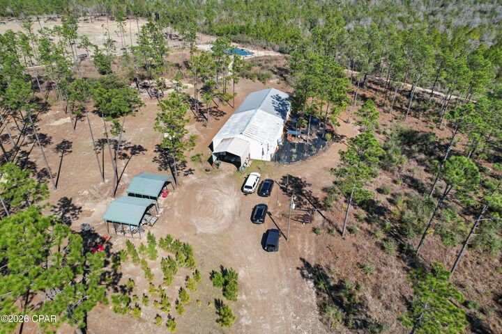 Property Photo:  25961 NW Walter Potts Road  FL 32438 