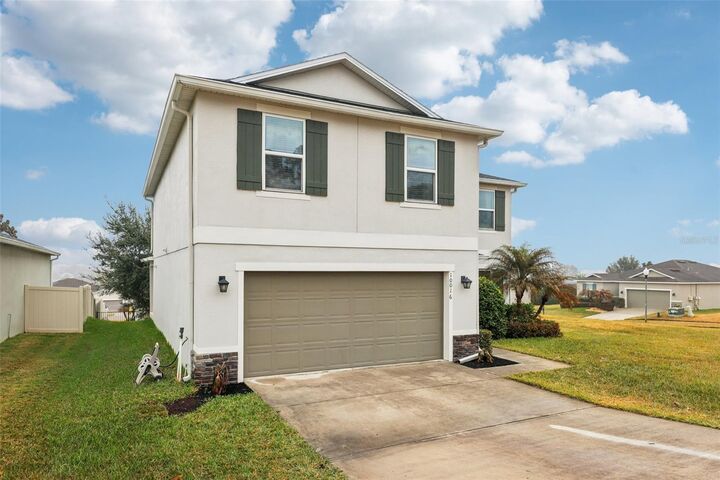 Property Photo: 10016 Weathers Loop FL 34711