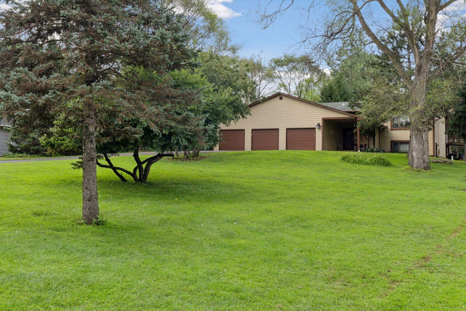 Property Photo:  9217 W River Road  MN 55444 