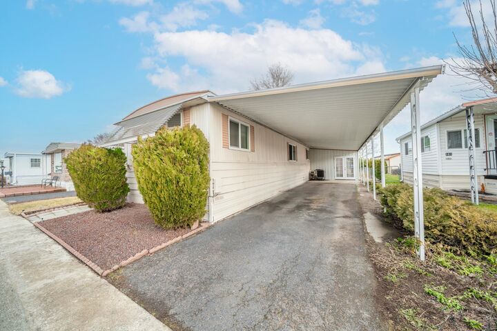 Property Photo:  1205 E Lyons Rd 162  WA 99208 