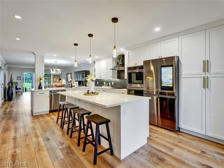 Property Photo:  458 Country Hollow Court H102  FL 34104 