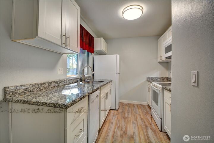 Property Photo:  4807  180th Street SW E105  WA 98037 