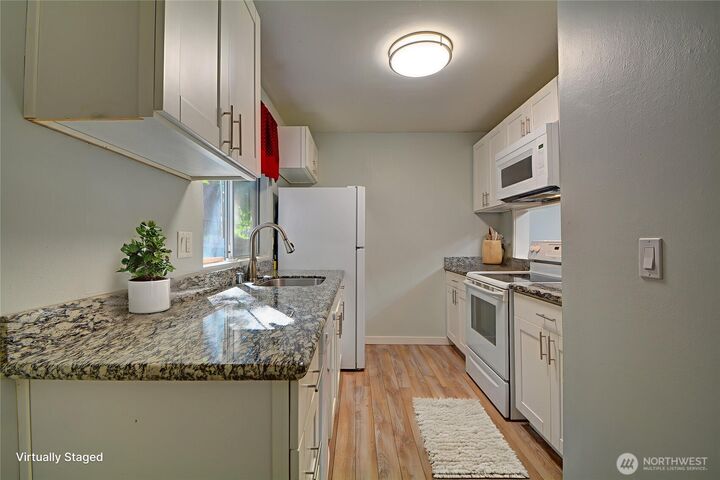 Property Photo:  4807  180th Street SW E105  WA 98037 