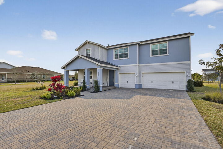 Property Photo: 1095 Tangled Orchard Trace FL 33470