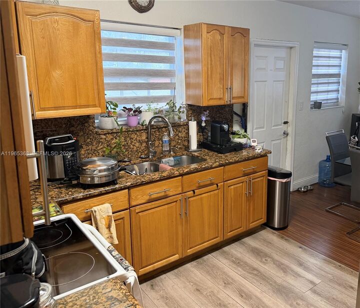 Property Photo:  550 NW 135th St  FL 33168 