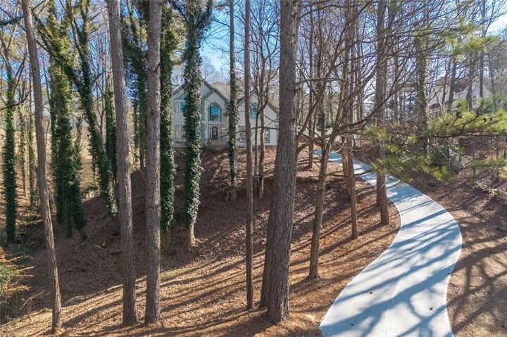 Property Photo:  9570 Huntcliff Trace  GA 30350 