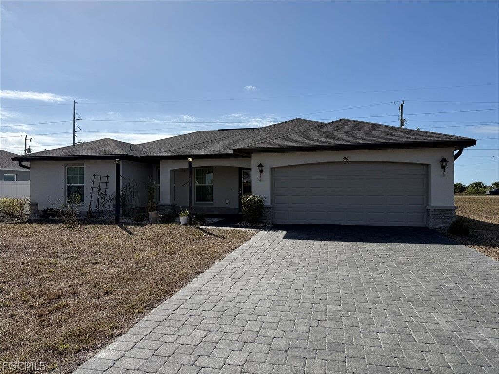 Property Photo: 910 NW 8th Terrace FL 33993