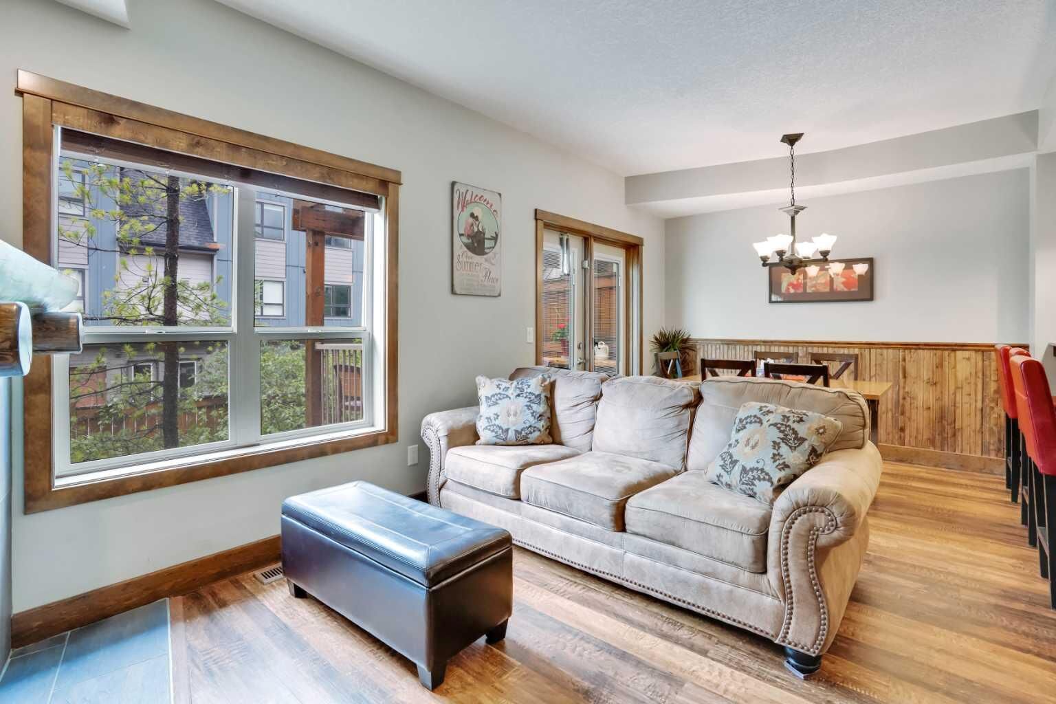 Property Photo: 121 Kananaskis Way 102 AB T1W 2X2