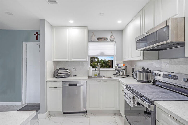 Property Photo:  6650 Royal Palm Boulevard 306C  FL 33063 