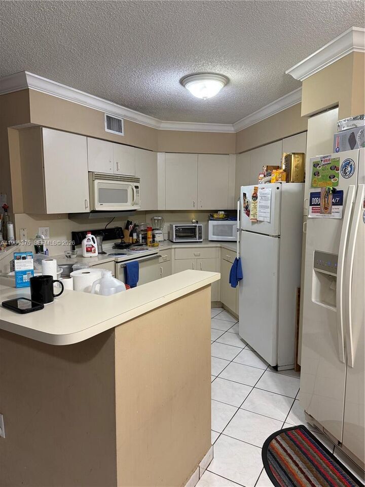 Property Photo: 4677 NW 9th St 106 FL 33126