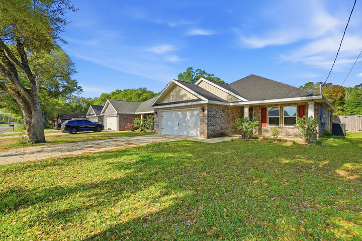 Property Photo: 4479 Watkins Street FL 32571