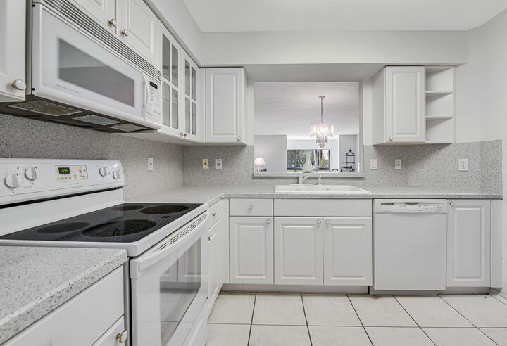 Property Photo:  12565 Imperial Isle Drive 208  FL 33437 