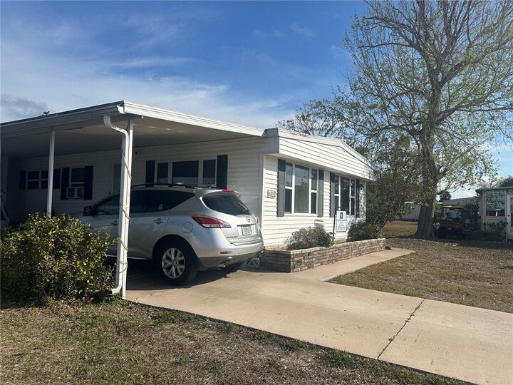 Property Photo:  6882 Holo Court  FL 34287 